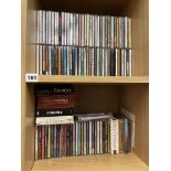 SHELF OF MUSIC CDS AND BOX SETS