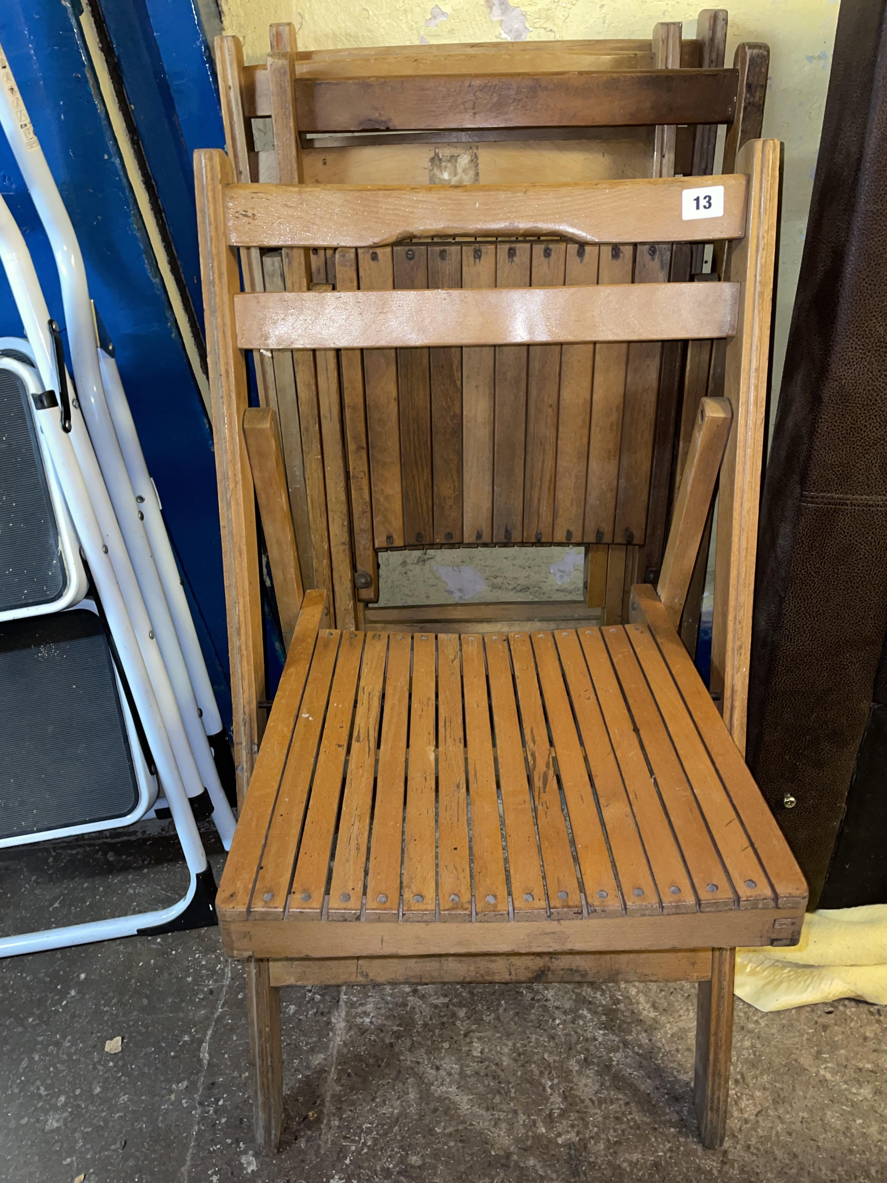 FOUR VINTAGE SLATTED FOLDING CONCERT CHAIRS