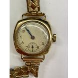 LADIES 9CT GOLD CASED WRIST WATCH ON EXPANDING BRACELET STRAP