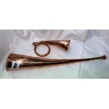 TWO COPPER EQUESTRIAN POSTING HORNS