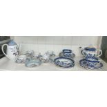 BOOTHS REAL OLD WILLOW PATTERN TEAPOT, CUPS AND SAUCERS AND A RIDGEWAY WHITE MIST COFFEE POT,