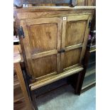 OAK TWO DOOR CABINET ON STAND