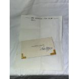 ENVELOPE CONTAINING A LOCK OF HAIR REPORTEDLY JOHN LENNONS SIGNED BY FREDA KELLY (SECRETARY OF THE