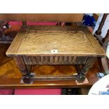 JACOBEAN STYLE OAK HINGED TOP STOOL