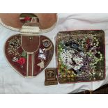 TIN OF VARIOUS COSTUME BEADS AND A HEART SHAPED JEWELLERY BOX