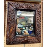 1903 DATED AND CARVED CUSHION FRAMED MIRROR 33CM X 39CM APPROX