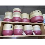 SELECTION OF RED BASED BAMBOO GRADUATED PLANTERS