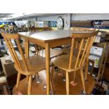 1950S/60S FORMICA TOPPED KITCHEN TABLE AND FOUR SPINDLE BACK CHAIRS
