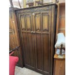 OAK LINENFOLD PANELLED WARDROBE