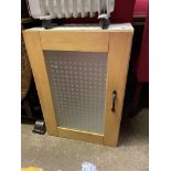 GLAZED CABINET AND A HEATER