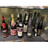 SHELF OF VARIOUS BOTTLES OF WINES AND SHERRY,