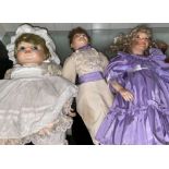 THREE DRESS DOLLS,