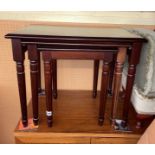 MAHOGANY NEST OF TABLES ON FLUTED LEGS