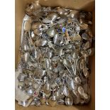 LARGE BOX OF WHITE METAL AND PLATED CONTINENTAL NOVELTY TEASPOONS