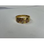 18CT GOLD RUBY AND DIAMOND RING SIZE P 4.