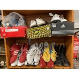 TWO SHELVES OF GOODYEAR, LONSDALE AND TIGER SPORTING SHOES AND A PAIR OF ADIDAS GOLF SHOES SIZE 6.