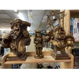 THREE GILDED SANTA CLAUS FIGURES