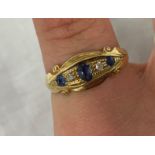 18CT GOLD SAPPHIRE AND DIAMOND CHIP RING SIZE M/N 2.