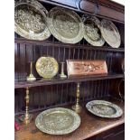 SELECTION OF BRASS EMBOSSED WALL PLAQUES,