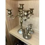 BRASS CANDELABRUM AND A PAIR OF CHAMBERSTICKS