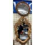 GILDED CARTOUCHE SHAPED MIRROR AND A CIRCULAR ACANTHUS FRAMED MIRROR