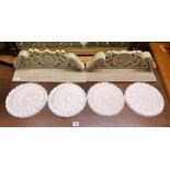 FOUR PETAL ROSETTES AND PAIR OF LIME WOOD EFFECT CARVED WALL SHELVES