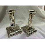 PAIR OF LONDON SILVER DWARF CANDLESTICKS WITH RIBBON TIED SWAGGED DECORATION A/F,