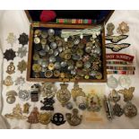 BOX CONTAINING MILITARY TUNIC BUTTONS, WHISTLES, CAP BADGES,
