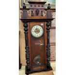 WALNUT CASED PENDULUM WALL CLOCK,