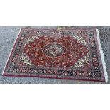 20TH CENTURY RED GROUND PATTERNED CARPET 212 X 138CM APPROX