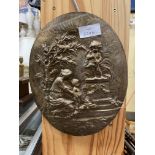 BRASS OVAL RELIEF PLAQUE DEPICTING MOTHER AND CHILD 25CM X 19CM