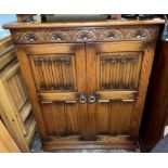 OAK LINENFOLD TWO DOOR CABINET