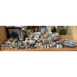 SHELF OF DUTCH DELFT BLUE AND WHITE POTTERY - CLOGS, COW CREAMER, JUGS,