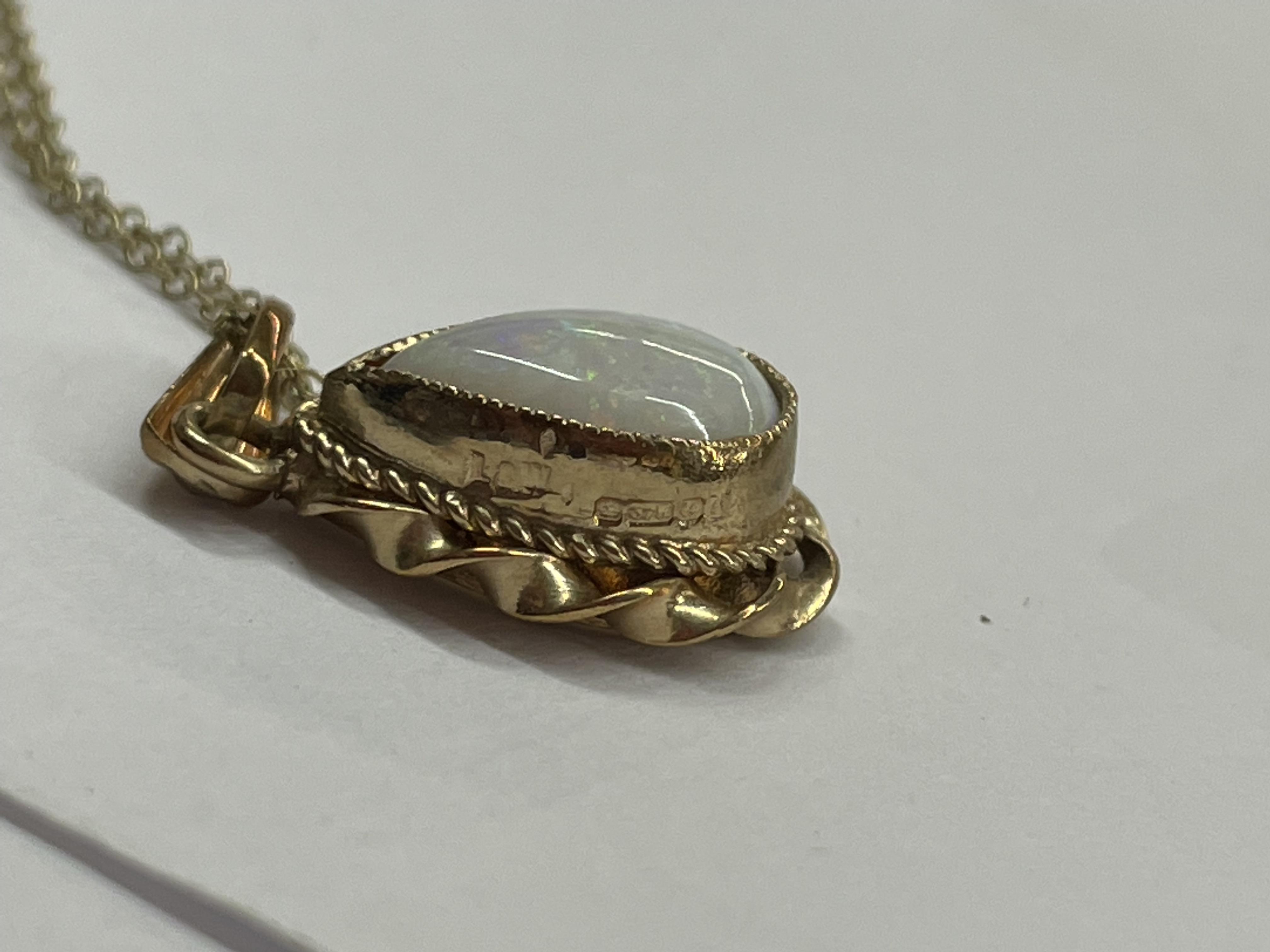 9CT GOLD TEAR DROP OPAL PENDANT ON TRACE CHAIN 2. - Image 2 of 2