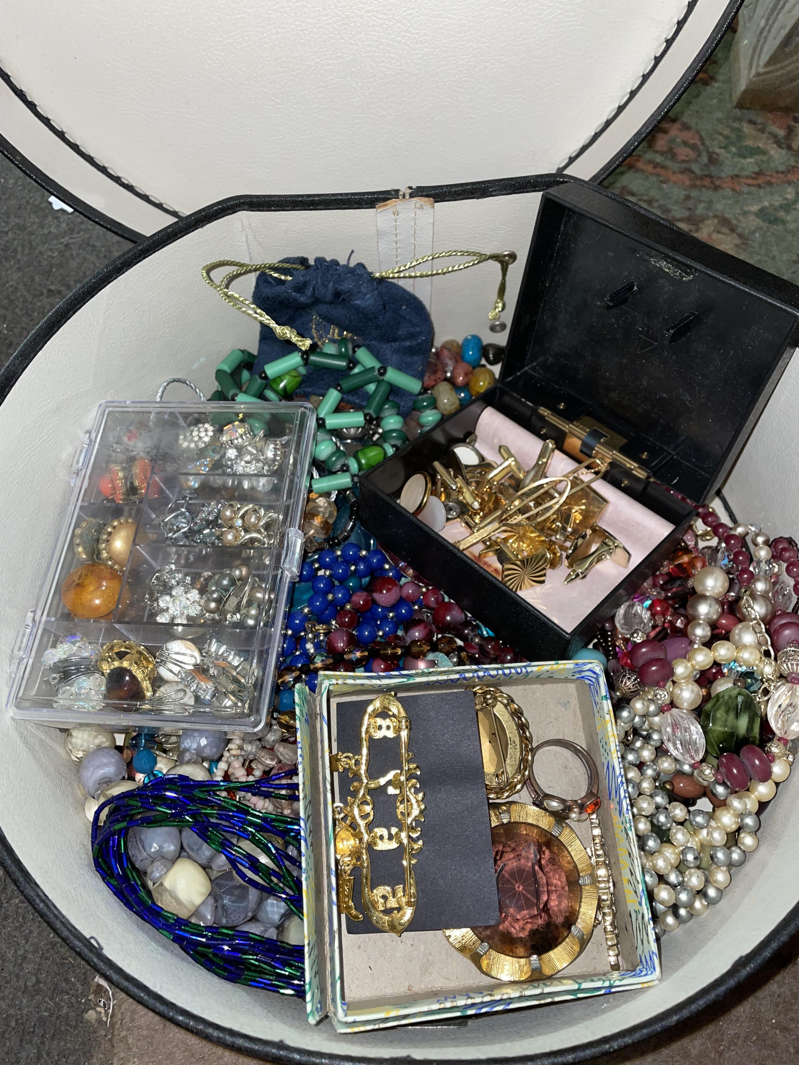 CIRCULAR BOX OF COSTUME BEADS, BROOCHES AND EARRINGS,