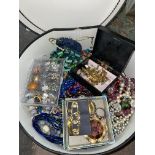 CIRCULAR BOX OF COSTUME BEADS, BROOCHES AND EARRINGS,