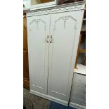 CREAM PAINTED FRENCH STYLE TWO DOOR WARDROBE AND A CREAM BEDSIDE CHEST