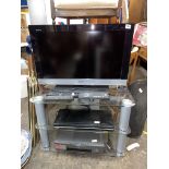 SONY BRAVIA TV ON MEDIA STAND WITH TOSHIBA DVD VIDEO PLAYER (WITH REMOTES)