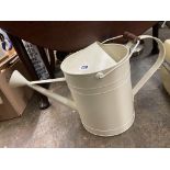 CREAM ENAMEL METAL WATERING CAN AND A WIRE WORK CANDLE HOLDER