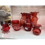 CRANBERRY GLASS AND CRIMPED BOWLS AND FOUR JUGS