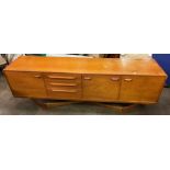 1960S TEAK LONG CURVED END SIDEBOARD (SIGNS OF SOME WATERMARKS TO TOP) 206CM W X 46CM D