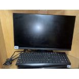 DELL MONITOR AND A WIRELESS KEYBOARD