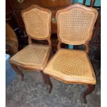 PAIR OF FRENCH WALNUT AND BERGERE CANED SALON CHAIRS