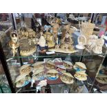 TWO SHELVES OF PLASTIC ORIENTAL CLAM DIORAMAS, OKIMONO, AND FIGURES,