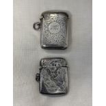 TWO SILVER ENGRAVED VESTA CASES