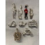 BAG OF SILVER LONDON AND LANDMARK RELATED CHARMS.