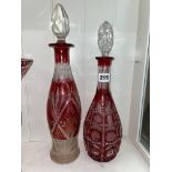 TWO RUBY ETCHED AND CUT MALLET SHAPE DECANTERS WITH STOPPERS