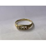 18CT GOLD RING WITH ONE STONE, FOUR MISSING STONES 2.