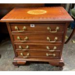 REPRODUCTION MAHOGANY CROSS BANDED OF FOUR DRAWERS ON OGEE BRACKET FEET 56CM HEIGHT, WIDTH 52 CM,