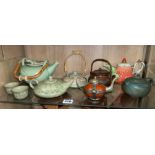 SHELF OF CHINESE AND JAPANESE DECORATIVE TEAPOTS
